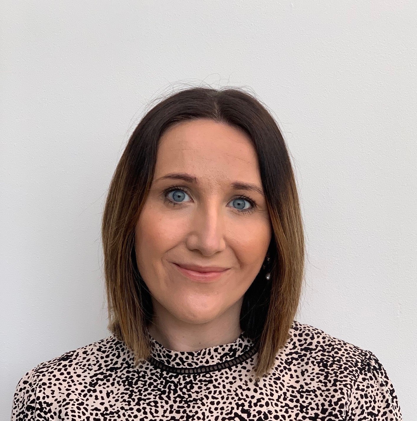 A headshot of Dr Charlotte Russell smiling