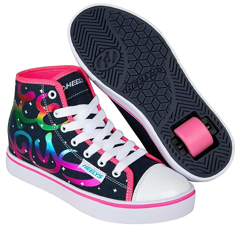 A pair of Heelys Veloz Girls Shoes in Denim/Rainbow by Heelys, featuring white laces, pink accents, a colorful swirl design, and low-profile wheels embedded near the heel—one shoe shows the side; the other displays the sole.