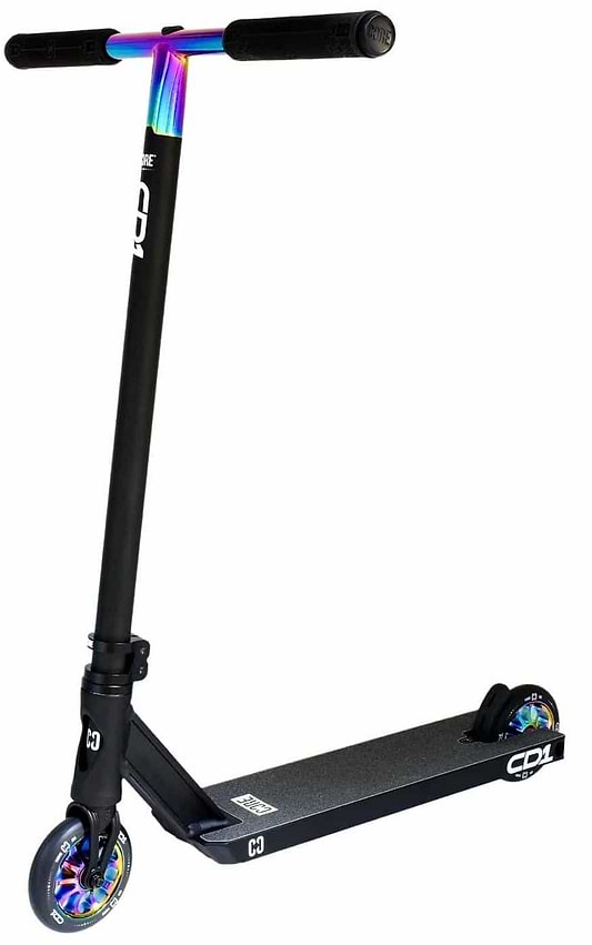 Introducing the CORE CD1 Complete Stunt Scooter in Neochrome and Black, an ideal choice for beginner riders. It features a vibrant handlebar and wheel design, along with a sturdy aluminum deck that provides a textured surface for enhanced grip. The CORE brand logo is prominently displayed on the neck and deck, blending style seamlessly with performance.