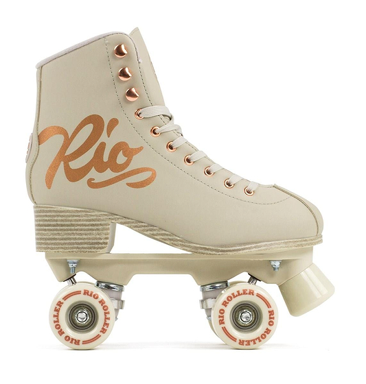 The Rio Roller Rose Quad Roller Skates - Rose Cream by Rio Roller boast a beige boot with elegant rose gold branding. They come in eco-friendly packaging and are adorned with metal eyelets and beige laces. The skates feature four wheels, each labeled "Rio Roller," as well as a high-collared boot and a rubber stopper at the front for a complete look.