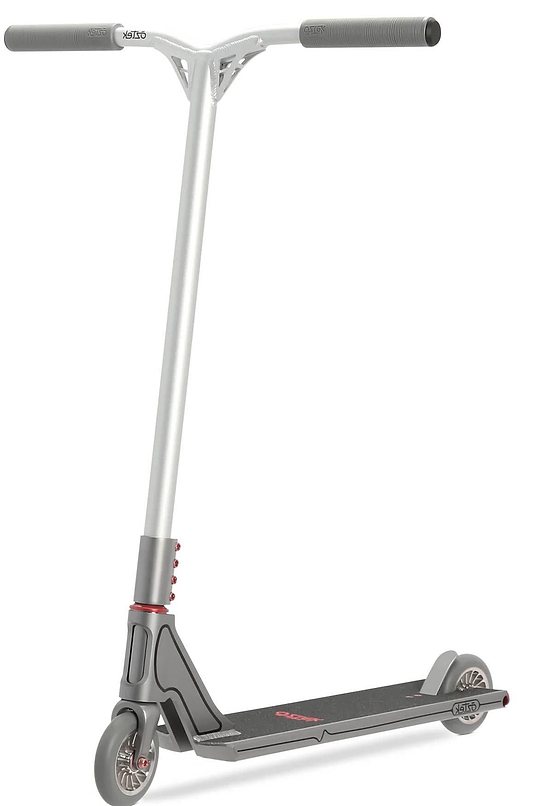 The Aztek Fountain Complete Stunt Scooter - Grey features a silver and black design, T-shaped handlebar with black grips, small wheels, wide deck, red base accents, and a sleek skatepark-ready look.