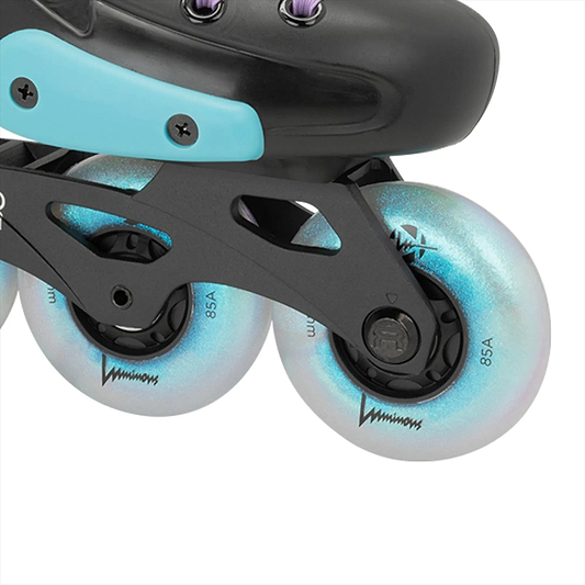 A close-up of an FR Skates Junior Adjustable Inline Skate in Luminous Black Pearl, featuring three FR Street King white wheels with a blue metallic sheen labeled "85A." The X-Series frame showcases angular cutouts.