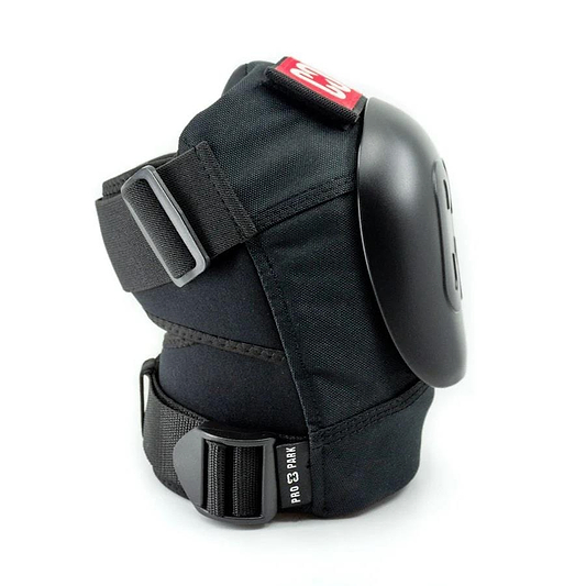 Introducing the CORE Pro Park Knee V2 Skate Protection Pads by CORE, featuring adjustable straps and a hard plastic cap—ideal for skatepark riders. These pads come with a distinctive red tag on top, making them suitable for skateboarding and other sports. Their ergonomic and durable design integrates a Dynamic Size System to ensure an optimal fit.