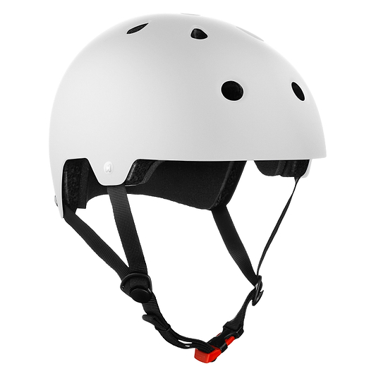 The CORE Action Sports Skate / Scooter Helmet in white by CORE features black adjustable straps, a red chin buckle, and multiple ventilation holes, all shown against a plain white background.