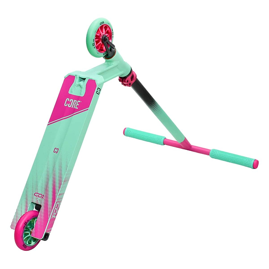 The CORE CD1 Complete Stunt Scooter from CORE is ideal for beginner riders, showcasing a lively teal and pink color scheme. It includes an eco-friendly handlebar, wide deck, T-bar grips, and small wheels specifically designed for tricks and maneuvers.