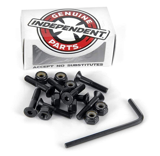 A set of black nylon-coated Allen bolts and lock nuts, accompanied by an Allen wrench, rests before a box labeled "Independent." The box features a red and black logo with the phrase "Accept No Substitutes," highlighting its branding as Independent Allen Key Skateboard Bolts - Black 7/8".