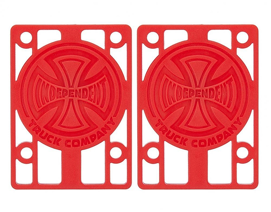 Two red Independent Skateboard Riser Pads, each measuring 1/8", showcasing the "Independent Truck Company" text and the iconic cross logos at the center. These durable risers are designed with pre-drilled holes for effortless mounting on your Indy trucks.