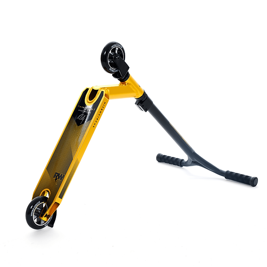 The Nitro Circus Ryan Williams Junior Replica Complete Stunt Scooter, crafted by Nitro Circus in a gold and black color scheme, is showcased against a white background. This stylish scooter features a sleek two-wheel design with a black handlebar and deck that highlights branding and graphic elements.