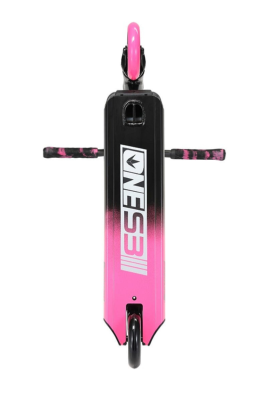 The Blunt Envy ONE S3 Complete Stunt Scooter in black and pink is photographed from above, featuring black handlebars with pink grips. The word "ONES3" is prominently displayed in white on the deck, which transitions along with the front wheel from vibrant pink to sleek black.