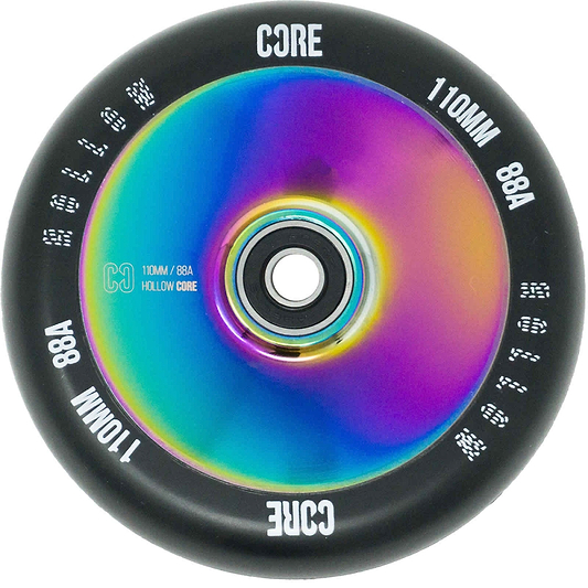 A close-up image of the CORE Hollow Core V2 110mm Stunt Scooter Wheel - Oil Slick Neochrome showcases a multicolor wheel with a metallic core. The black rim features the inscriptions "CORE" and "110MM 88A," complemented by ABEC-9 bearings, while the inner surface displays iridescent patterns that reflect various colors.