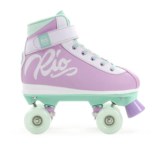 The Rio Roller Milkshake Quad Roller Skates - Mint Berry by Rio Roller showcases a purple boot with the "Rio" logo, paired elegantly with mint green wheels and toe stop. These pastel skates are enhanced with lilac accents and a classic white lace-up front, creating a perfect fusion of retro charm and contemporary style.