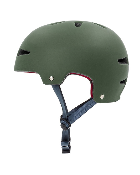 The REKD Ultralite In-Mold Skate/Scooter Helmet in green offers a lightweight, matte finish with a smooth surface and a black adjustable chin strap. Engineered for action sports, it incorporates side ventilation holes and boasts a sleek, rounded design to ensure both safety and comfort.
