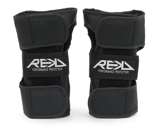 Two black REKD Skate Protection Wrist Guards, adorned with "REKD" on the front straps, are crafted for action sports. They include adjustable velcro straps for a secure fit and offer 360° protection, ensuring both comfort and safety.