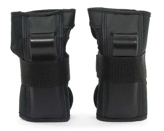 The REKD Skate Protection Wrist Guards in black, featuring Velcro straps and plastic reinforcements for 360° protection during action sports, are displayed upright against a white background.
