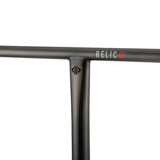 Close-up of a metallic gray handlebar from the Drone Relic 3 Steel Oversized SCS Stunt Scooter Bars, made of durable Chromoly 4130 steel. The handlebar showcases the "Drone" brand name and three distinctive red lines on the crossbar, along with a subtle logo beneath the T-joint, complementing its minimalist design.