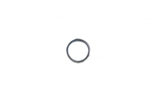 A timeless, unadorned metallic ring rests on a plain white surface, similar to a single Sushi Skateboard Axle Speed Washer crafted to minimize friction and boost performance.