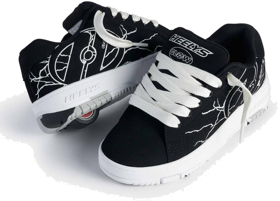 The Heelys Kolect Glow Boys Shoes in Black/White by Heelys feature white laces, white soles, and a cracked design. A visible wheel in the heel highlights their built-in rolling feature for kids.