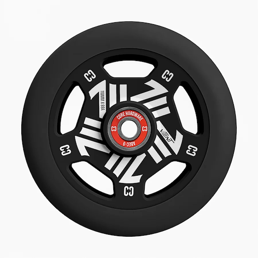 The CORE Vent 110mm Stunt Scooter Wheel by CORE features a black solid rubber tire, a black and white five-spoke geometric core, and a red metal "CORE HARDWARE ABEC-9" bearing for durable performance.