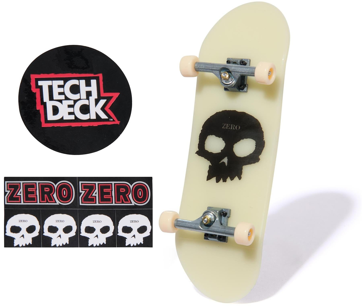 The Tech Deck 96mm M57 Fingerboard - Zero features a miniature skateboard design with a black skull graphic, Tech Deck logo sticker, and Zero brand stickers with skulls and the word "ZERO.