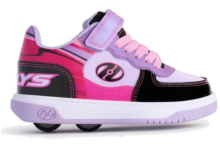 The Heelys Rezerve Low X2 Girls Shoes in black, purple, and pink feature a strap, laces, two wheels in the heel, a side logo, and a light purple sole—perfect for kids.