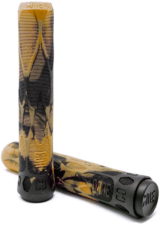 The CORE Pro Bark Black/Gum Stunt Scooter Grips (170mm) feature a diamond texture, shock-absorbing rubber in black and tan, and secure bar ends. One grip stands upright while the other is horizontal. Brand: CORE.
