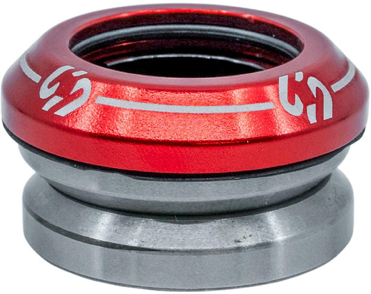 The CORE Icon Integrated Stunt Scooter Headset in red features durable bearings for smooth rotation, with white markings on the upper red section and a metallic lower part, shown against a white background.