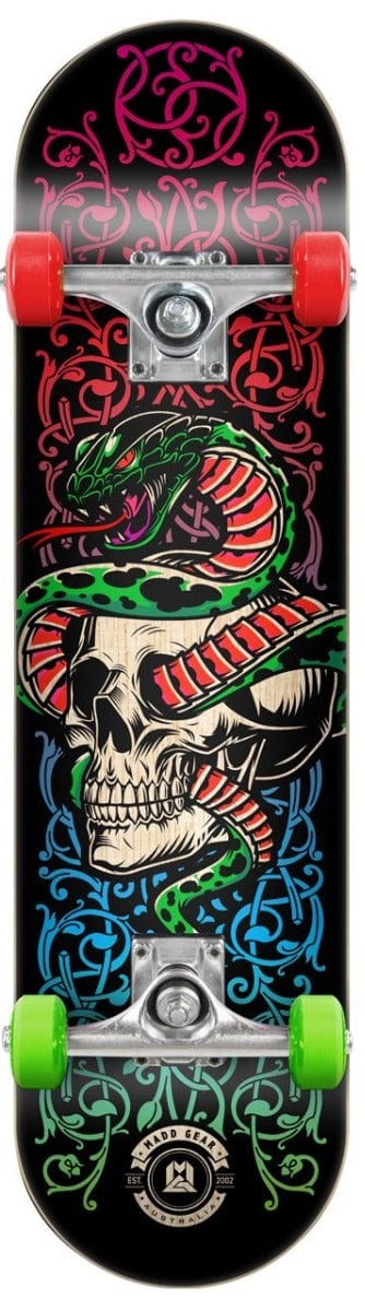 Introducing the Madd Gear MGP Pro Series Snake Pit Black Complete Skateboard, an ideal choice for beginners. This skateboard features a bold design with a skull and green snake entwined against detailed red and blue patterns. It is constructed with a durable 9-ply maple deck and comes with eye-catching red and green wheels.