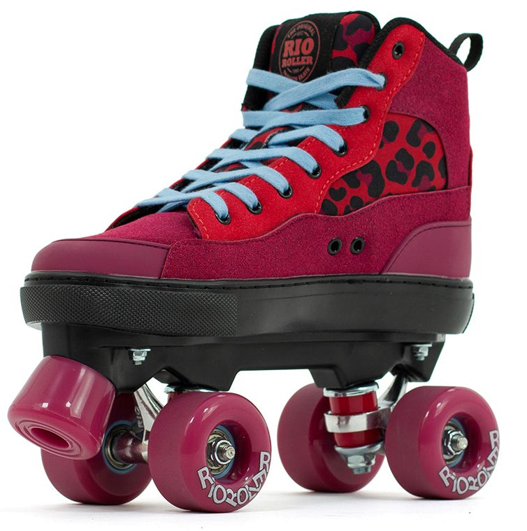 The Rio Roller Beats Quad Roller Skates in Red/Leopard feature a vibrant red and black vegan-friendly design with light blue laces, leopard print accents, pink wheels, and the Rio Roller logo on the tongue and wheels.