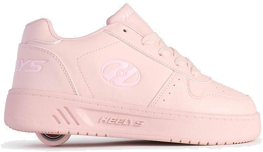 The Heelys Kama Girls Shoes - Pink combine classic court style with fun, featuring a light pink design, single low-profile wheel in the heel, lace-up front, and side logo.
