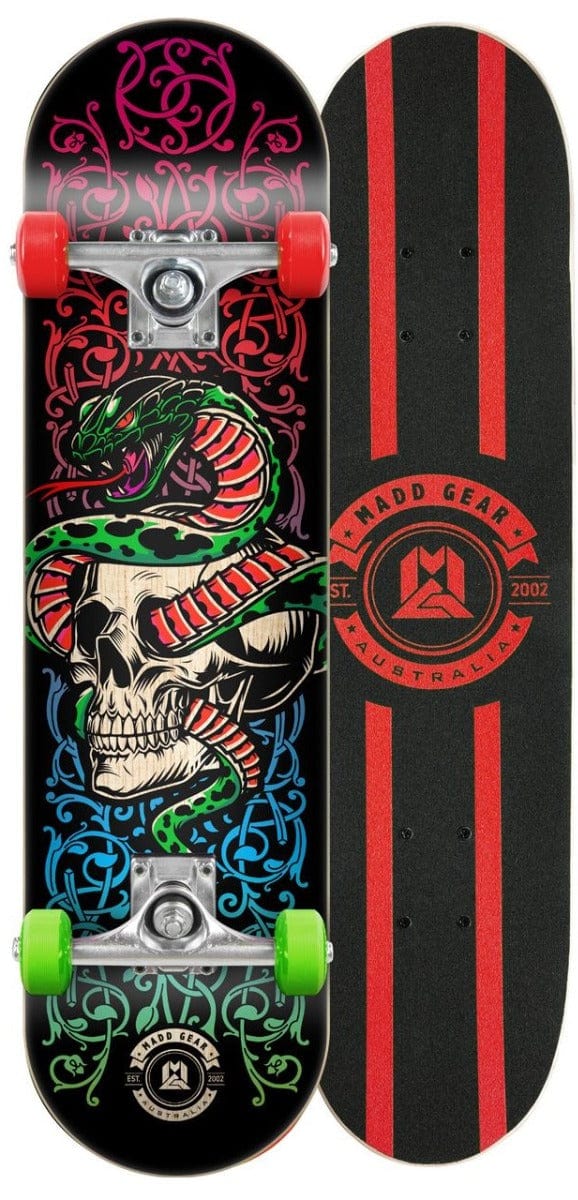 The Madd Gear MGP Pro Series Snake Pit Black Complete Skateboard - 8" x 31", ideal for beginners seeking a blend of style and quality, showcases two designs: the left board features a coiled snake over a skull adorned with colorful patterns, while the right board from the Madd Gear PRO line highlights a sleek black background accented by two red stripes and the Madd Gear logo.
