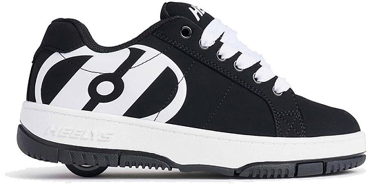 The Heelys Kolect Boys Shoes by Heelys come in black and white, feature white laces, a prominent white circular logo on the side, and a single rear wheel with ABEC 5 bearings embedded in the sole.