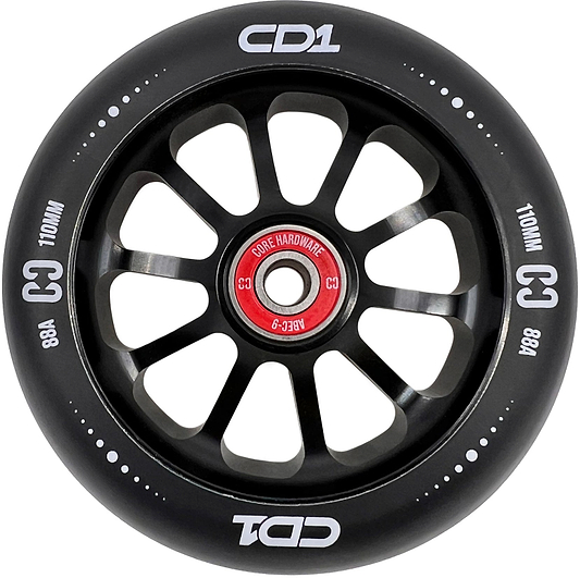 The CORE CD1 110mm Stunt Scooter Wheel - Black features a black and silver finish, red core, white "CD1" and "CORE HARDWARE" text, and multiple spokes—an eye-catching design from CORE.