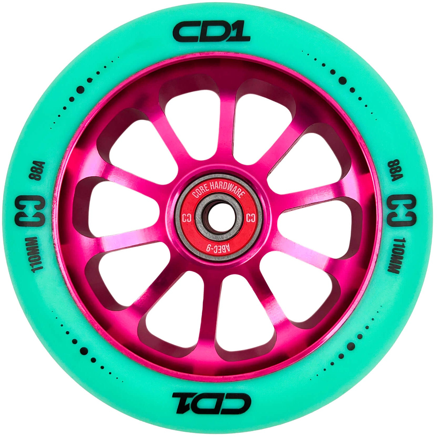The CORE CD1 110mm Stunt Scooter Wheel - Teal / Pink features a metallic pink multi-spoke hub and teal rubber with “CD1,” “C3,” “88A,” and “110MM” in black. The bearing is visible at the center. Brand: CORE.