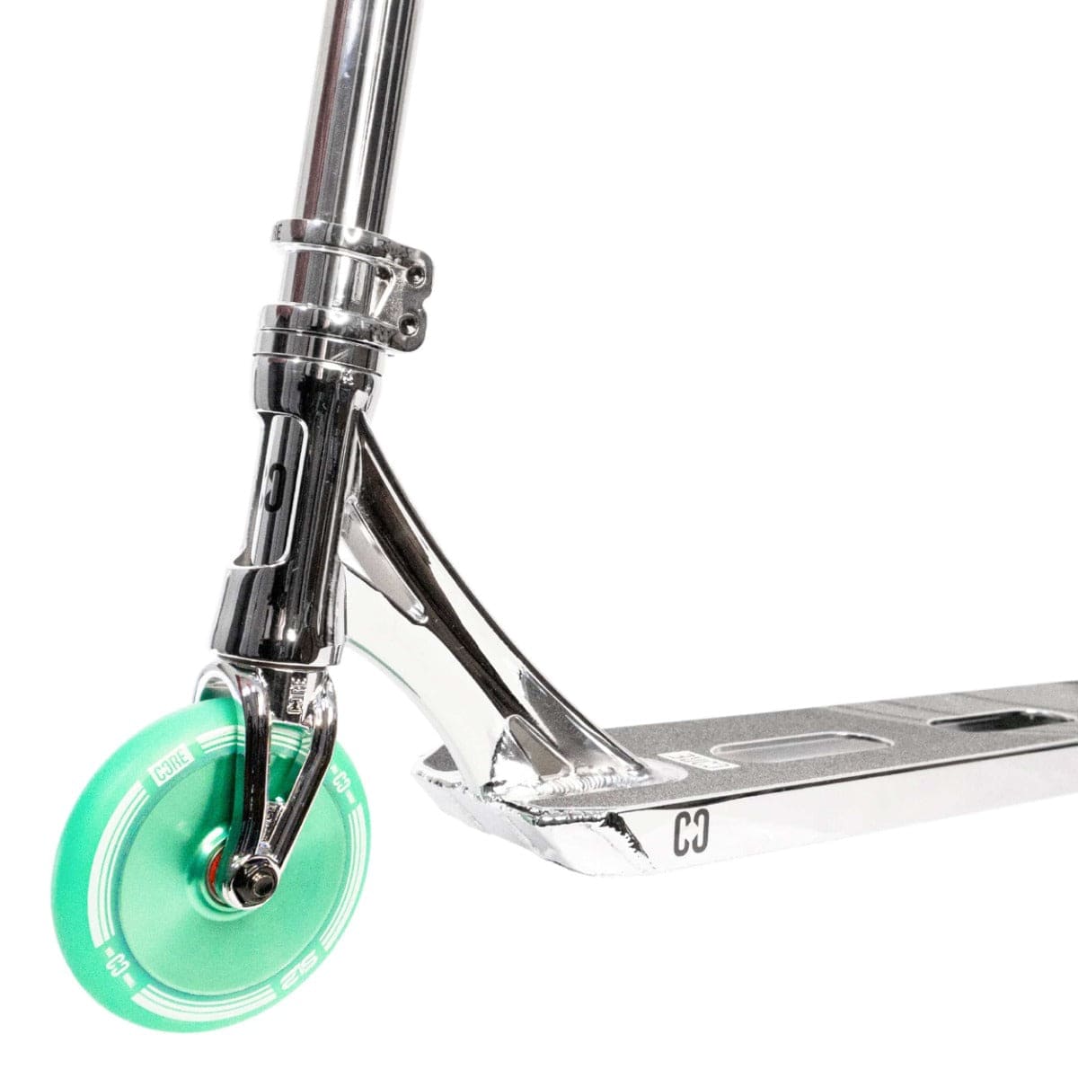 Here is a detailed look at the CORE SL2 Complete Stunt Scooter in Chrome and Teal. The scooter boasts a sleek chrome frame, complemented by its striking teal front wheel and robust deck. The fork and handlebars are prominently displayed, emphasizing the modern design and durability that CORE scooters are known for.