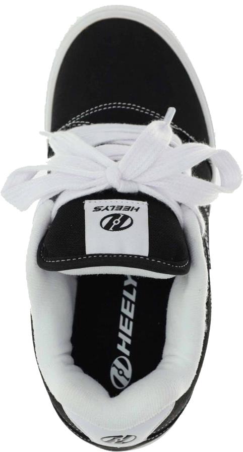 Top view of the Heelys Pro 25 Boys Shoes in black and white with white laces, Heelys branding on the tongue and insole, and signature low-profile wheels for smooth rolling.