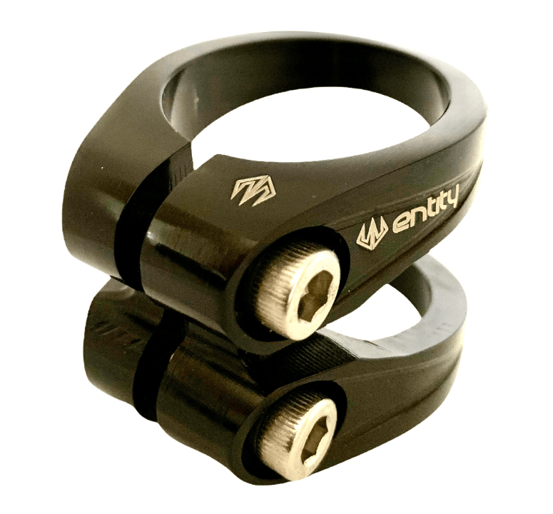 The Entity Exile 2 Bolt Oversized Stunt Scooter Clamp - Black is a black, cylindrical, and durable clamp featuring an engraved logo. It has two hex bolt fasteners for secure attachment and is shown in a close-up view against a white background.