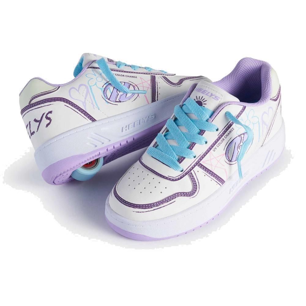 Heelys Kama Colour Changing Girls Shoes in white, lilac, and blue feature pastel heart designs and a retractable wheel in the heel, letting kids roll with fun. From Heelys.