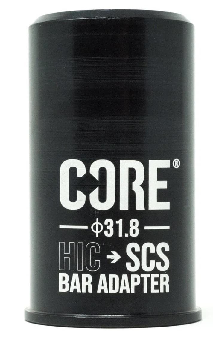 CORE's black oversized scooter bar adapter seamlessly connects HIC bars, featuring a cylindrical design with "CORE HIC To SCS Oversized Scooter Bar Adapter" in white text.
