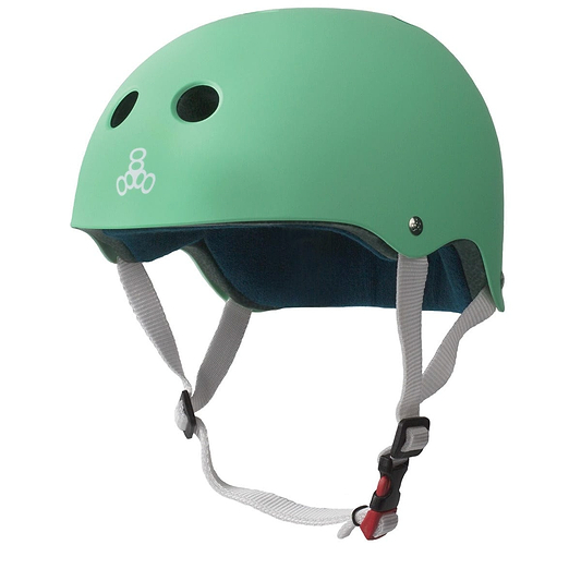 The Triple 8 Certified Sweatsaver Skate Helmet in Rubber Mint showcases a stylish blend of function and fashion with its ventilation holes, white adjustable straps, and dual-certified protection featuring high-impact absorbing EPS foam. Captured against a plain white background, it provides both safety and style for every skate session.