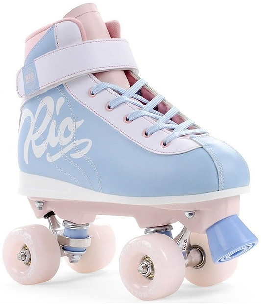 The Rio Roller Milkshake Quad Roller Skates - Cotton Candy, from Rio Roller, feature a pastel blue and pink color scheme in a figure skate style. These skates showcase the "Rio" branding on the side, a high-top design with pink laces, and light pink wheels. Complete with a supportive strap and sleek finish, they epitomize stylishness.