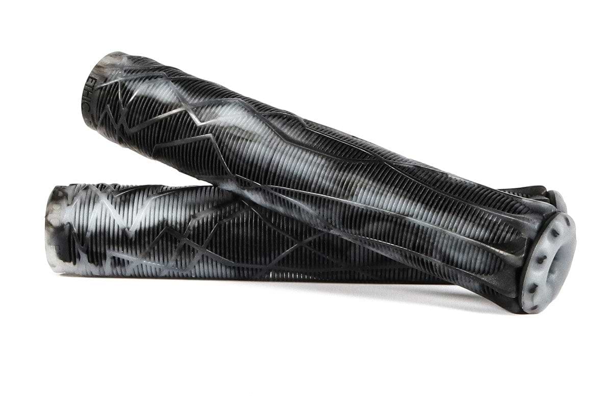 Two Ethic DTC Black/White Stunt Scooter Grips, measuring 170mm each and made from durable thermoplastic rubber, are displayed on a white background. Their textured surfaces include a ribbed pattern and zigzag design, with one grip laid across the other for emphasis.