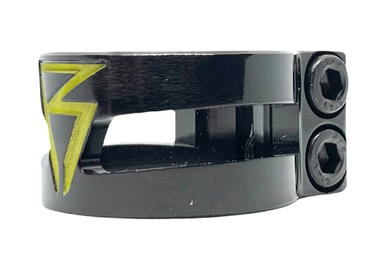 Introducing the Revolution Super Lite 2 Bolt Oversized Stunt Scooter Clamp in black, expertly crafted from 6061-T6 aluminium. This stylish bicycle clamp is adorned with a striking yellow lightning bolt design and includes two hex bolts to ensure a secure fit. With its modern silhouette, it is perfect for oversized IHC or HIC bars, beautifully displayed against a pristine white background.