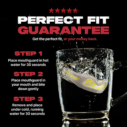 A glass mug filled with water and a Safejawz Nitro Series Protection Mouthguard (Grey/Yellow) soaking inside.