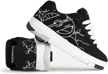 A pair of Heelys Kolect Glow Boys Shoes in black/white by Heelys, featuring white cracking patterns, white soles and laces. One stands upright; the other on its side shows the detachable heel wheel—ideal for kids who love wheel shoes.