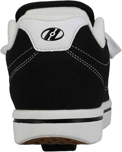 Rear view of Heelys Pro 25 Boys Shoes in black and white, featuring white stitching, a branded heel tab, gum rubber outsole, and low-profile wheels for smooth rolling.