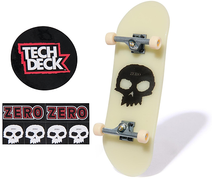 The Tech Deck 96mm M57 Fingerboard - Zero features a miniature skateboard design with a black skull graphic, Tech Deck logo sticker, and Zero brand stickers with skulls and the word "ZERO.
