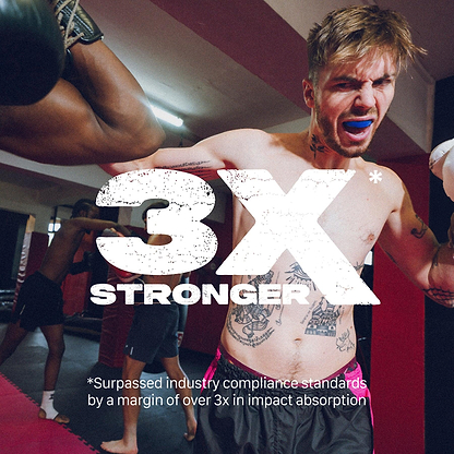 A tattooed male boxer wearing a blue Safejawz Intro Series Protection Mouthguard blocks a punch in the gym. Bold text: “3X STRONGER.” Caption notes Safejawz delivers jaw stability, absorbing over 3x the industry standard impact.