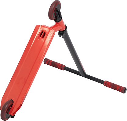 The Legacy Raze Complete Stunt Scooter by Legacy in red and black is shown tilted on its side, displaying the underside of the deck, two red wheels, and handlebars with red grips.