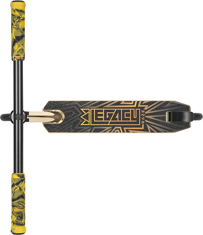 A top-down view of the Legacy Raze Complete Stunt Scooter by Legacy in gold and black, featuring black handlebars with yellow-black patterned grips and a black deck with a gold geometric design and "LEGACY" text.