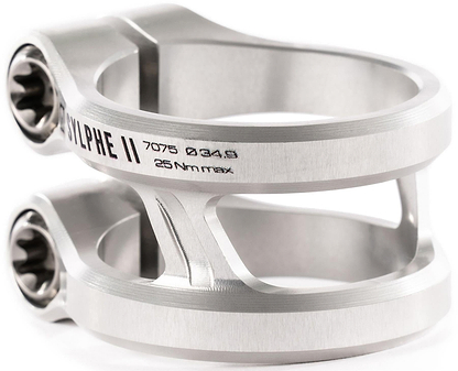 Close-up of the Ethic DTC Sylphe V2 2 Bolt Oversized Stunt Scooter Clamp in Raw finish, featuring engraved "SYLPHE II 7075 034.9 25Nm max." text, a smooth design, and visible bolt heads on each side. Brand: Ethic.
